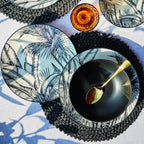 inspiracja zastawy stołowej malindi włoskiego producenta Tognana z motywem liści na talerzu obiadowym i deserowym oraz czarnym do zupy wykonanej z porcelany